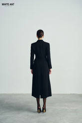 Tailored Wool Maxi Coat With Structured Lapels And Streamlined Fit For Formal Outerwear